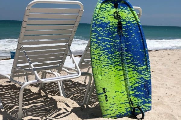Rented boogie board resting on beach chair on Vero Beach