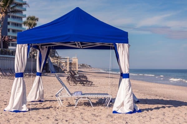 Beautiful beach cabana with beach chair set up on Vero Beach