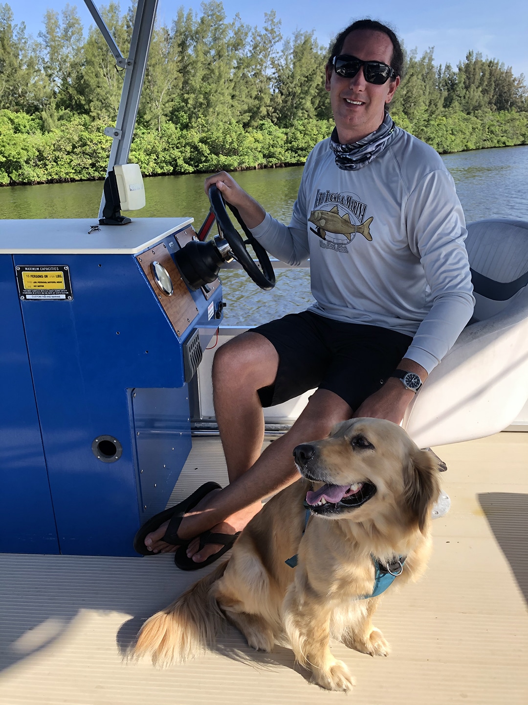 Vero Tackle owner Chris Woodruff and dog Mildred giving boat tour